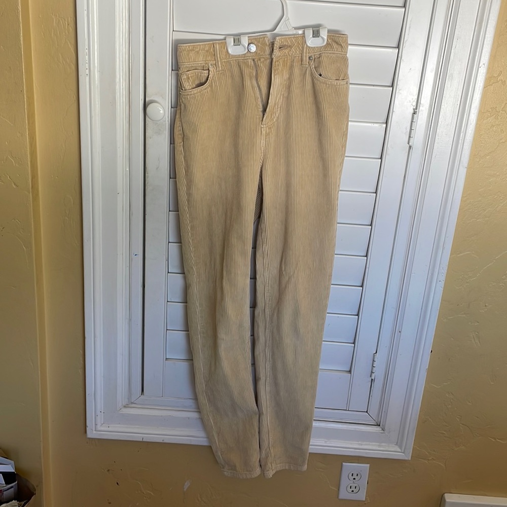 Cream/tan colored corduroy jeans. High rise and mom styled.
